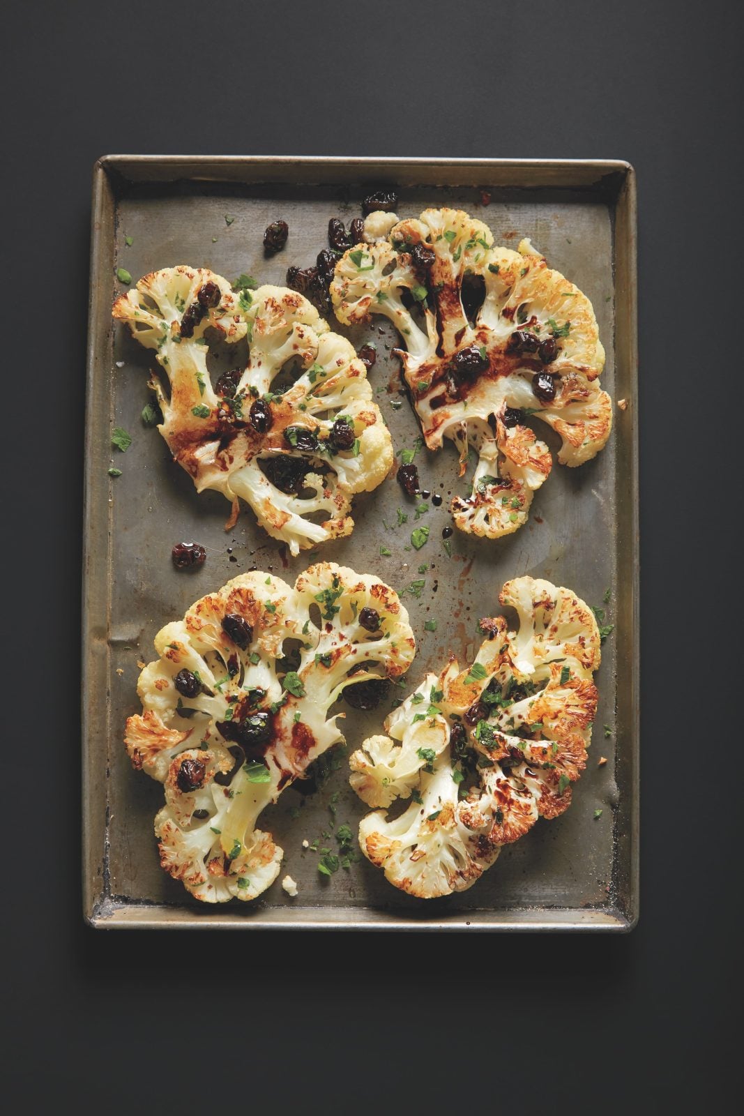 Whole Roasted Cauliflower with Raisins and Balsamic Glaze